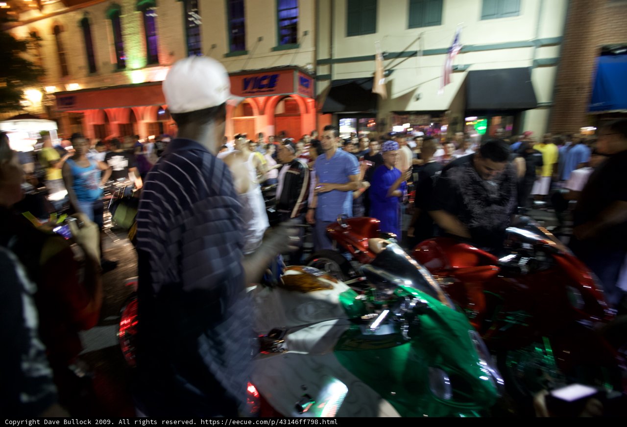 Motorcycle Rider Admires the Austin Crowd