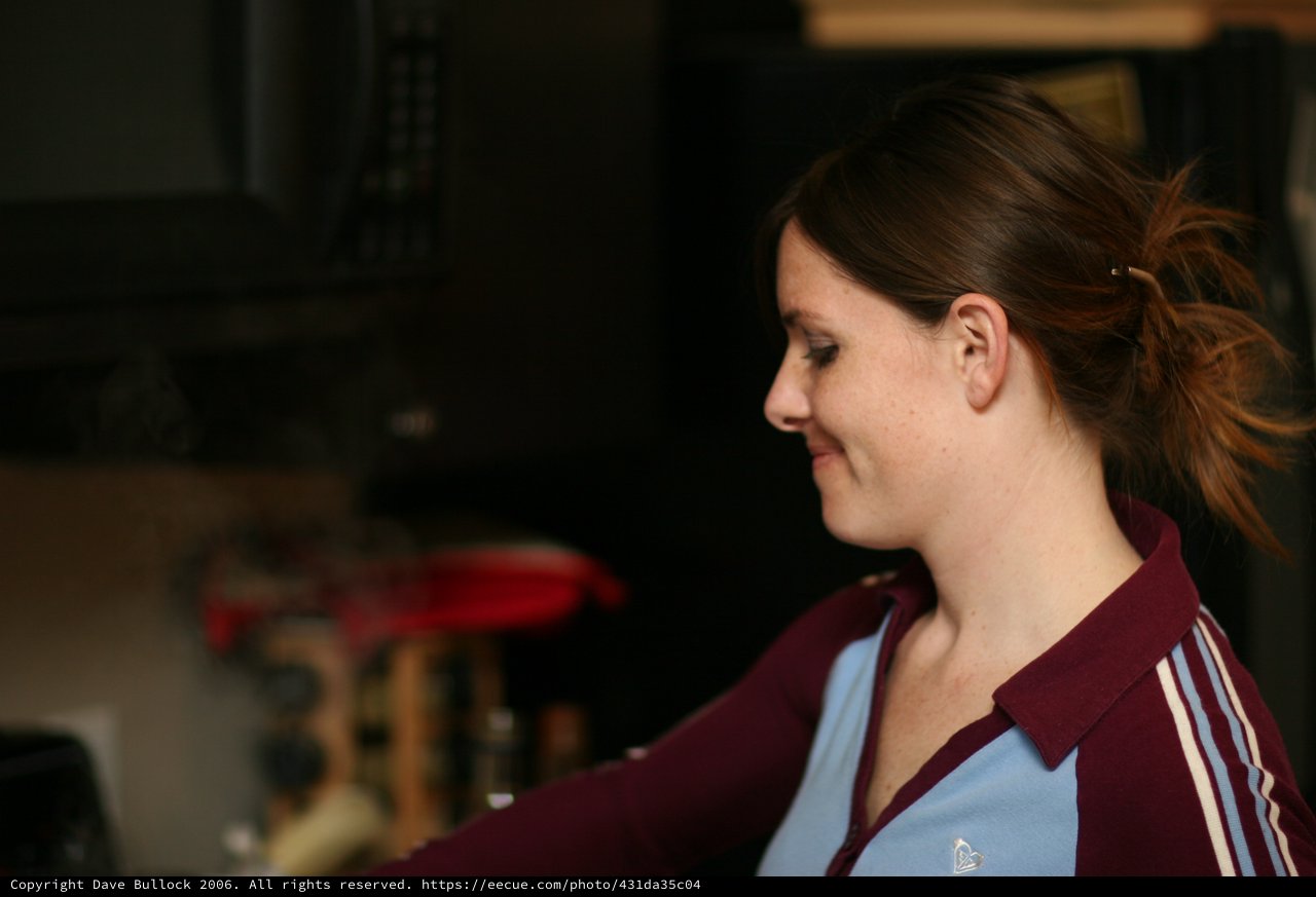 Candid Profile Portrait of Smiling Young Woman