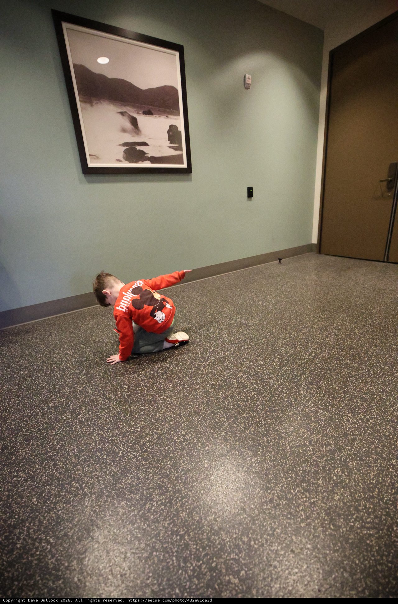 Young Boy Reaching in Empty Hallway at Skywalker Ranch