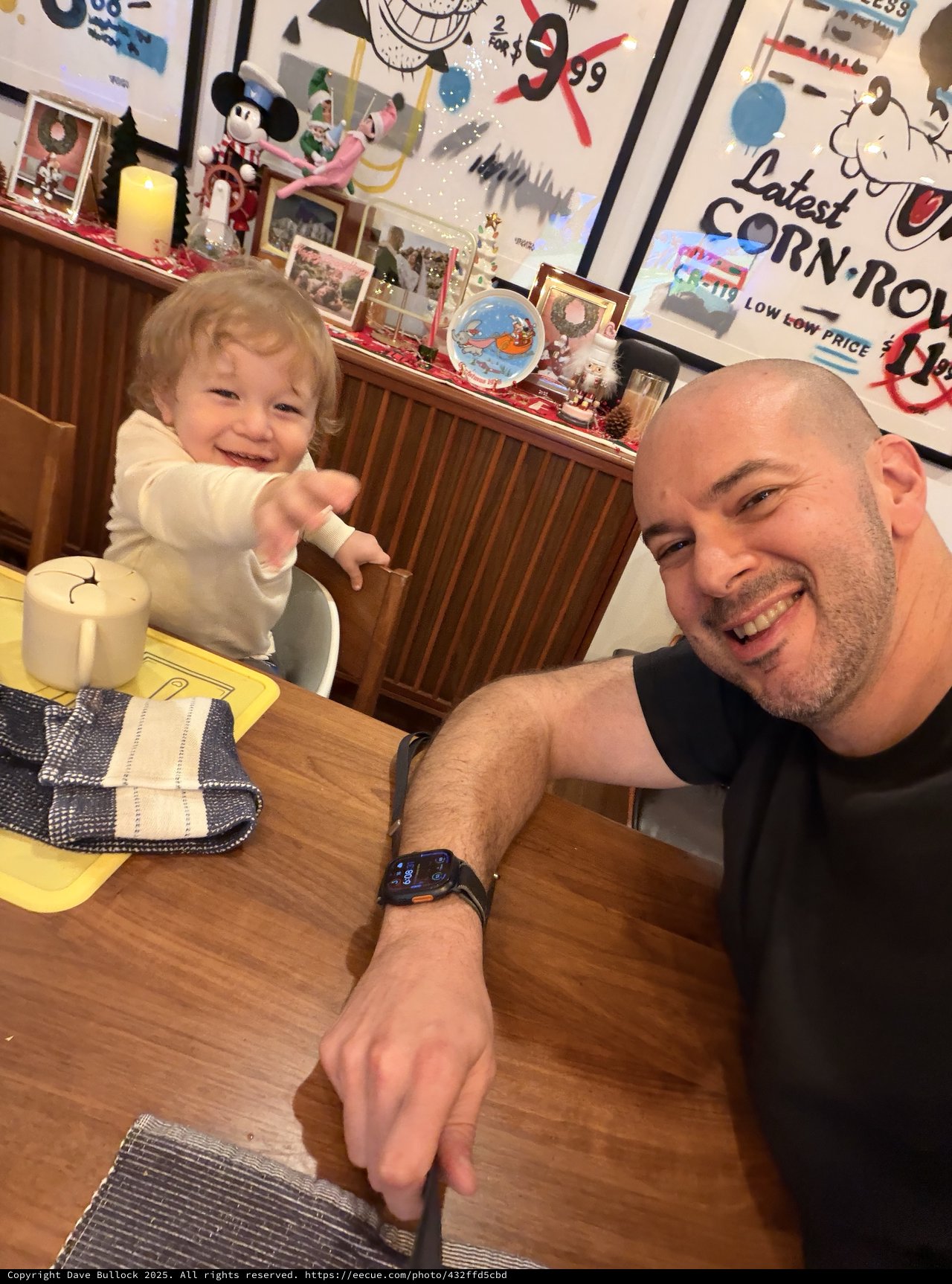 Father and Toddler Sharing Mealtime at Home