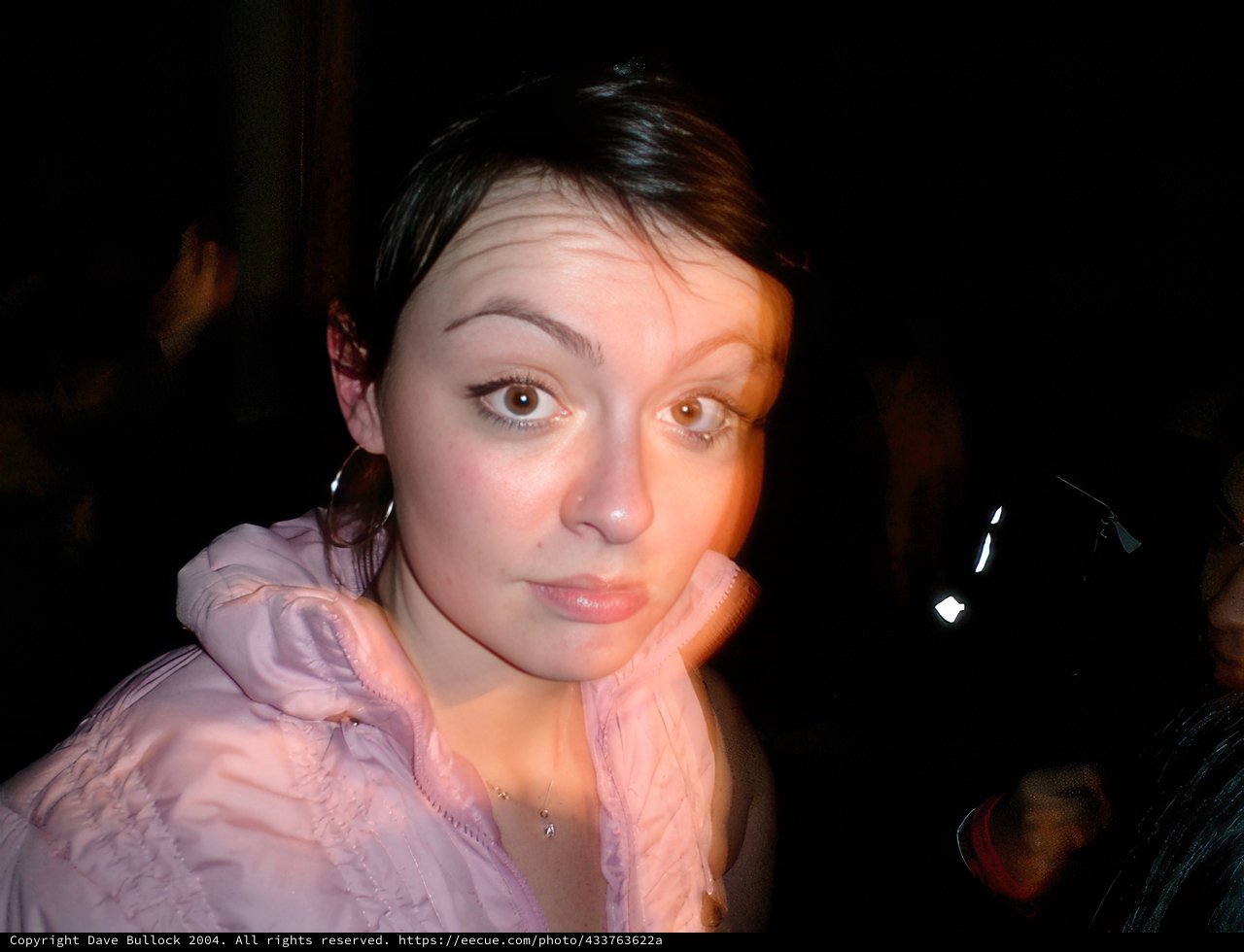 Blurred Portrait of a Woman in the Dark
