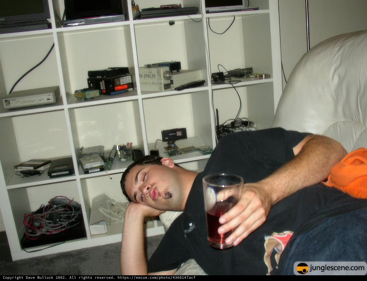 Man Relaxing on a Comfortable Couch