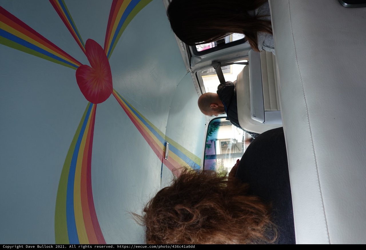 Colorful Van Interior with Rainbow Ceiling Decoration