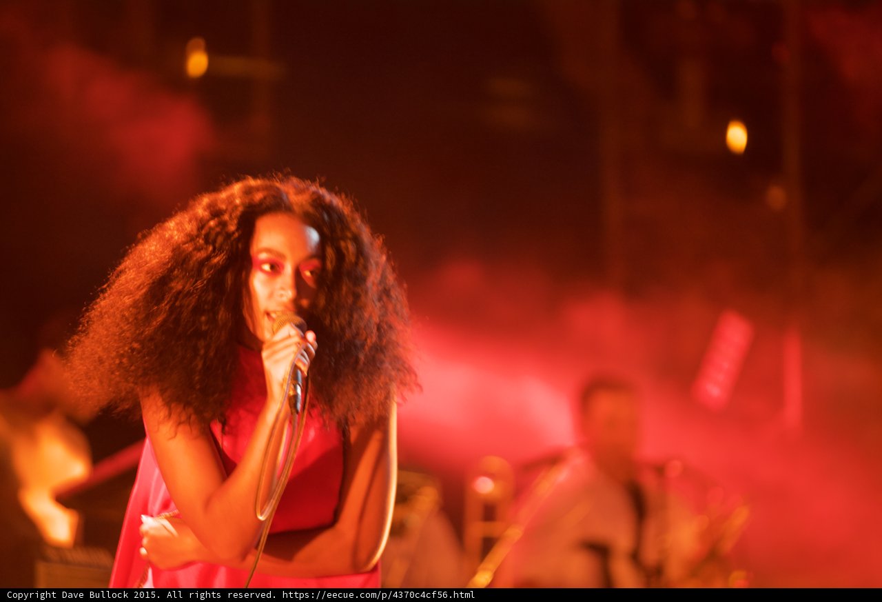 Solange Portrait Singing Band Member Background Red Pink Light