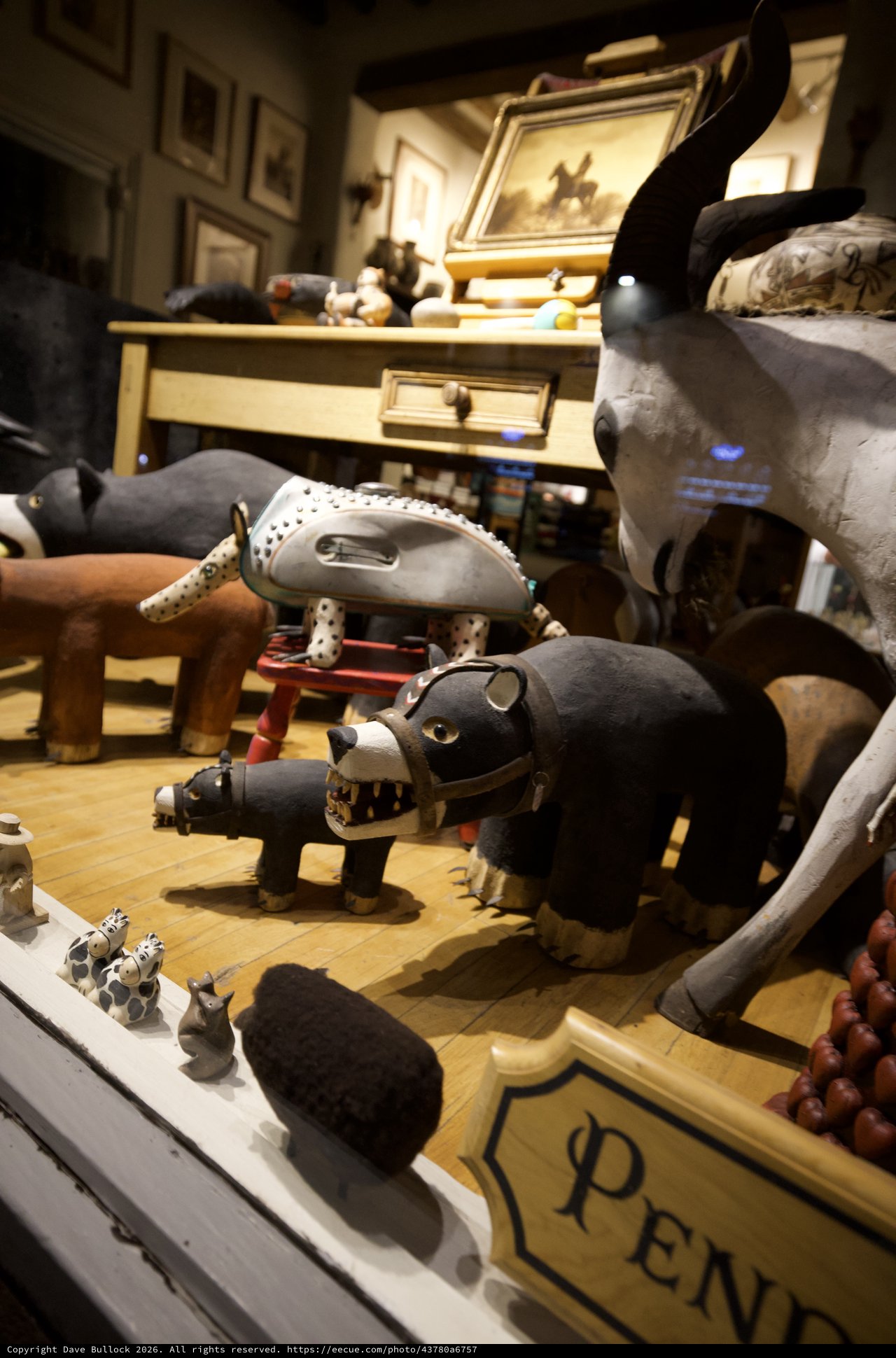 Handcrafted Folk Art Animal Collection on Wooden Display