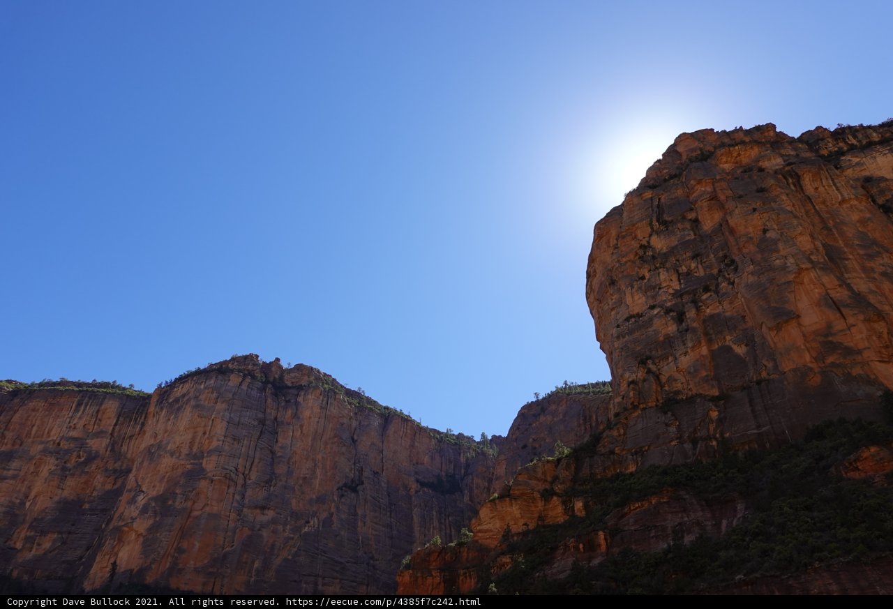 Sunlight illuminates the majestic canyon walls