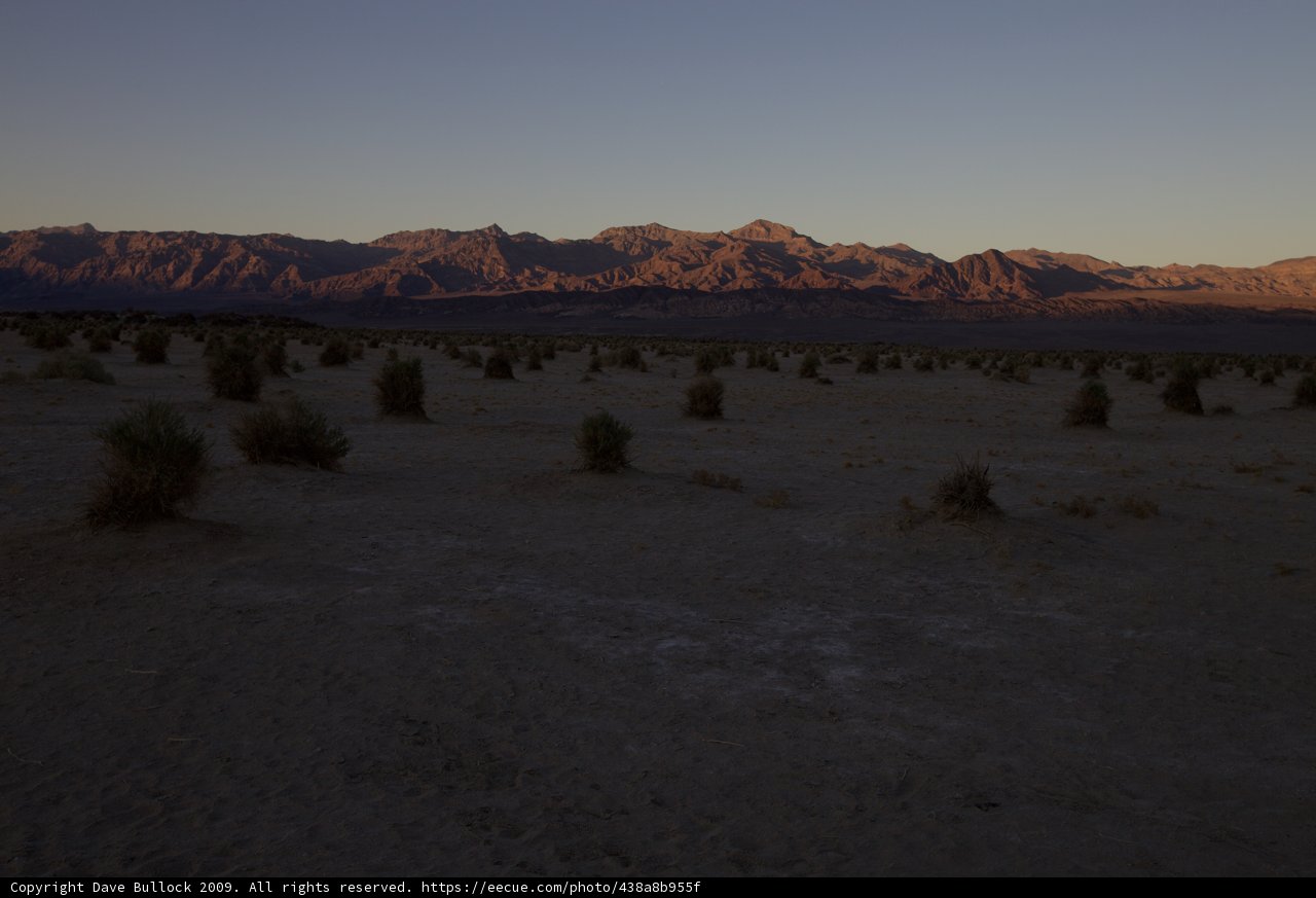 Desert Sunset Over Mountain Range