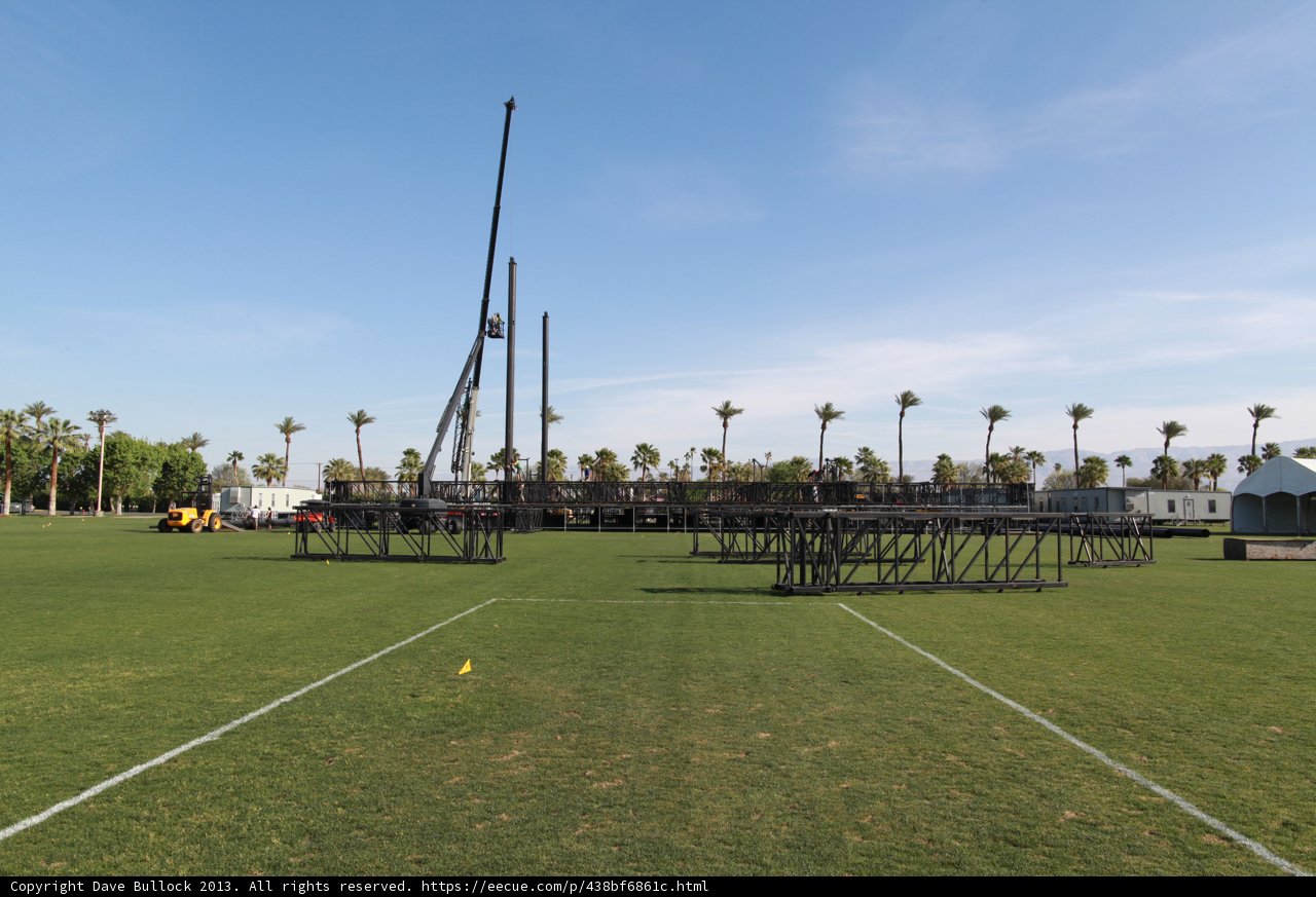 Poles Rising High Above a Vast Field