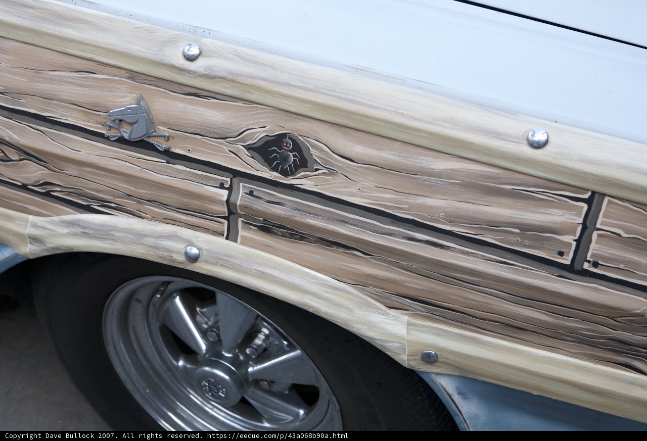 A Vintage Car with Wooden Paneling
