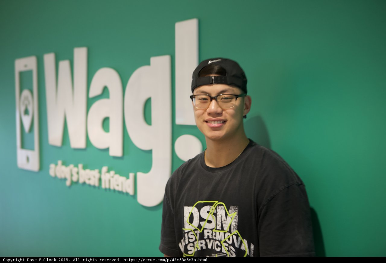 Ning Zetao Rocks the Classic Hat and T-Shirt Combo in front of WAG Logo