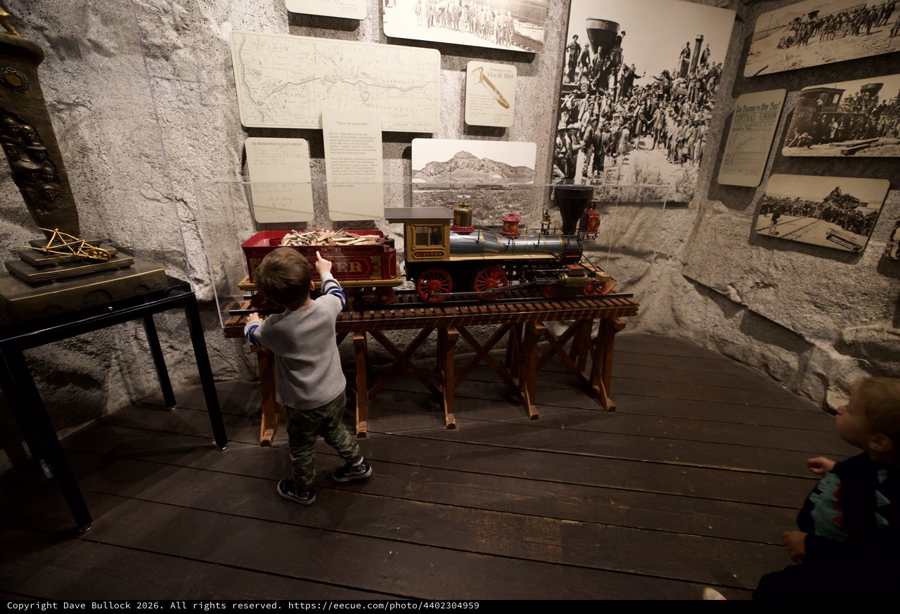 Young Child Discovers Historic Train Model at Museum