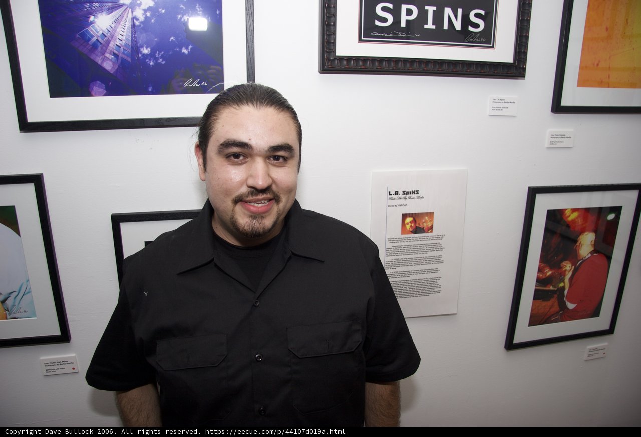 Man Admiring Art in Gallery