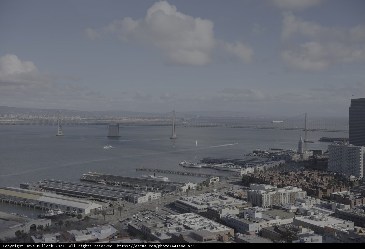Bay Bridge Over A Metropolis