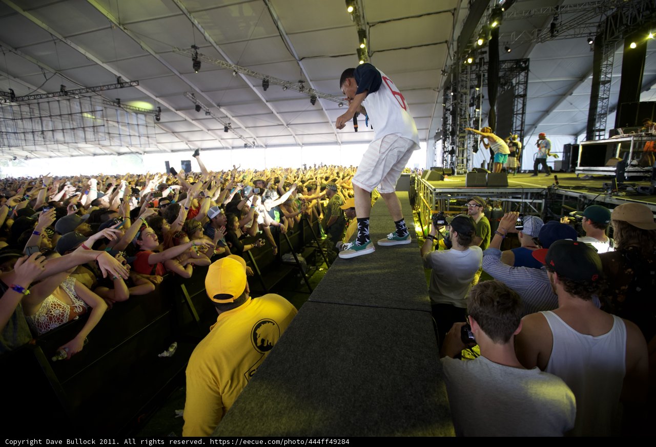 Man on Stage with Enthralled Crowd