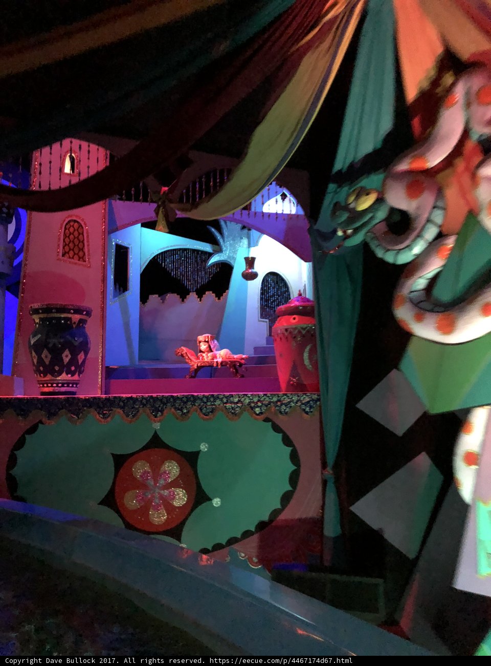 Colorful Stage with Snake and Man in Costume