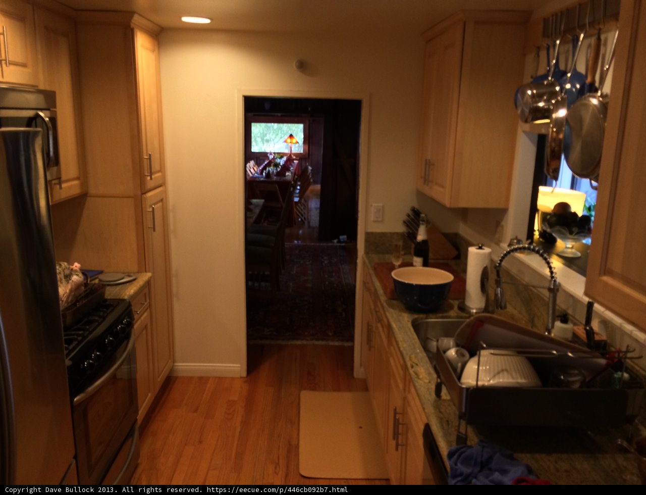 Modern Kitchen with Hardwood Flooring and Stainless Steel Appliances