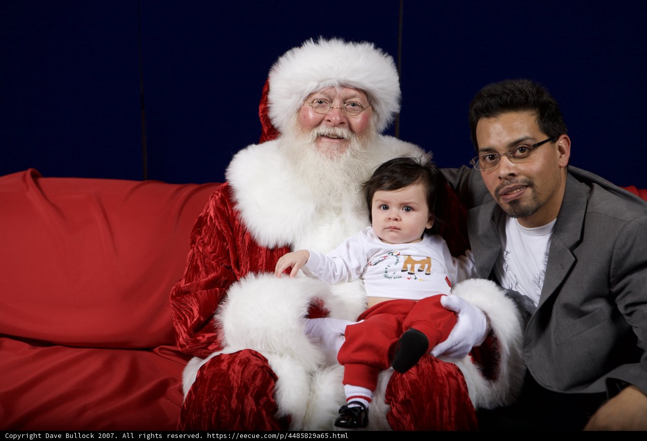 Festive Family Portrait with Santa Claus