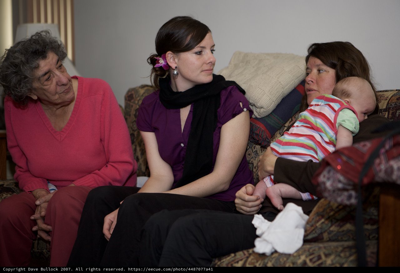 Three Generations of Women Share a Quiet Moment