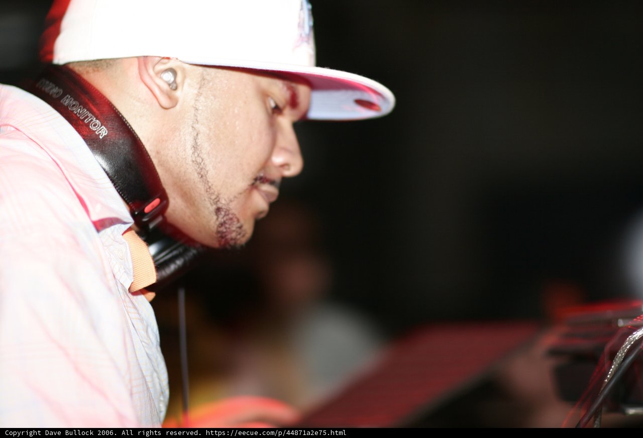 Grooving with His Hat and Headphones