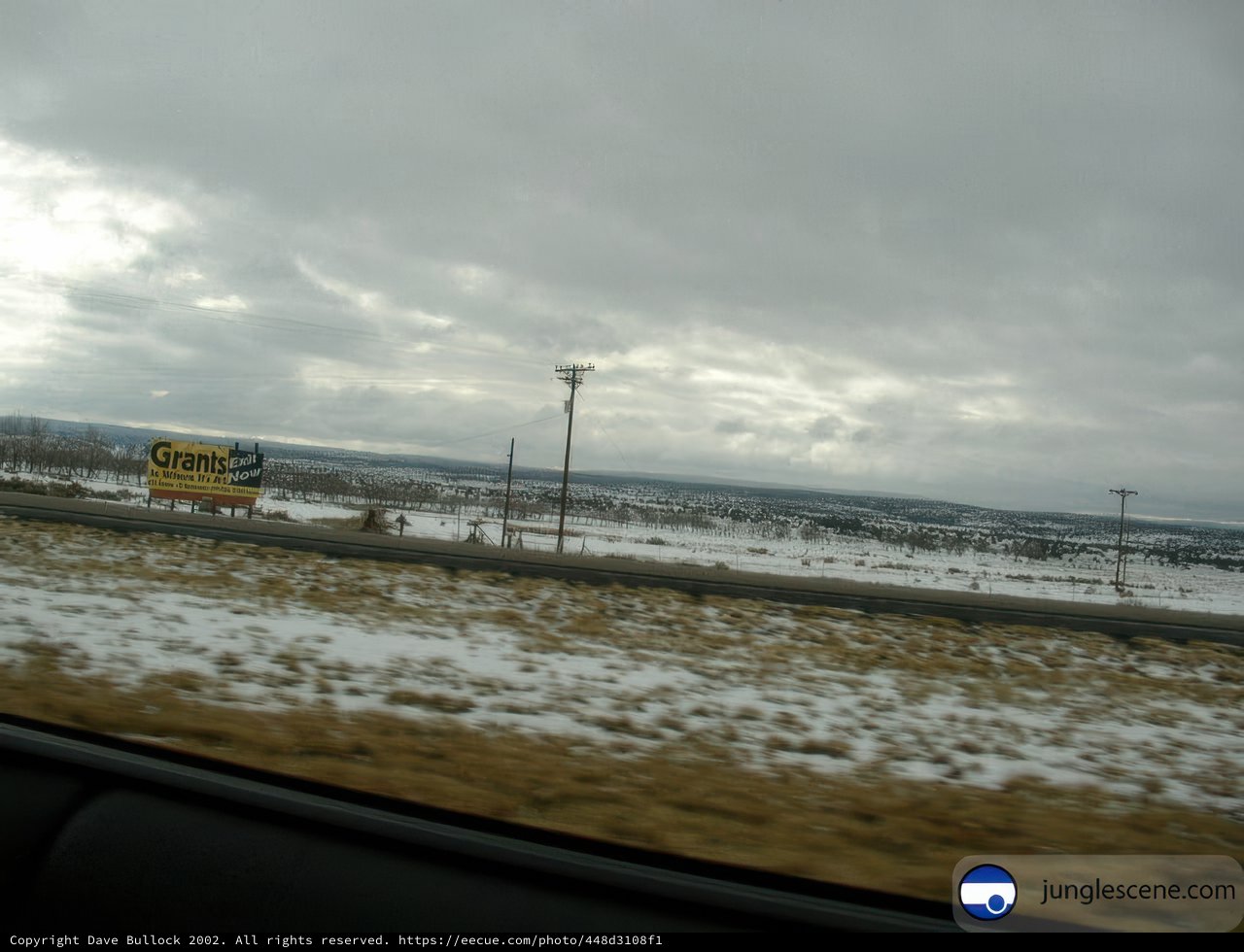 Snowy Landscape through the Car Window