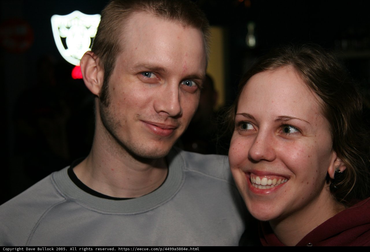 Smiling Couple Pose for a Portrait