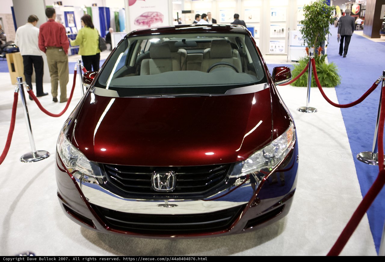 Red Honda Sports Car Shines at Car Show