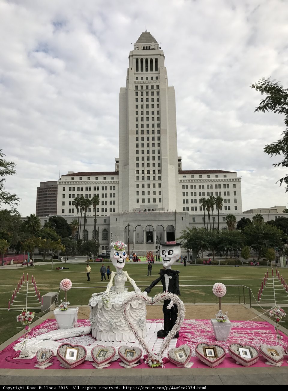 A Chic Wedding Cake Displayed in the Heart of the City
