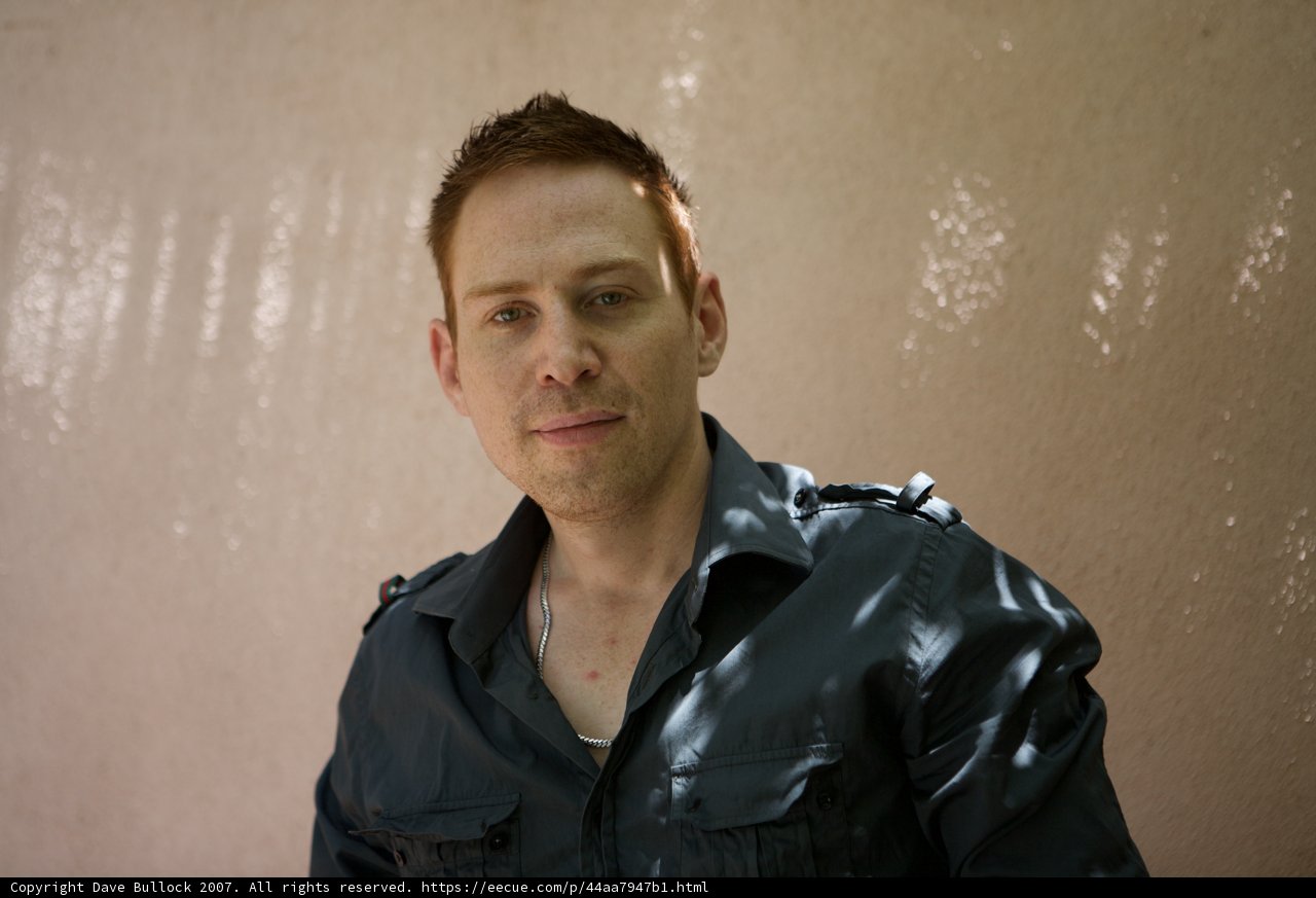 Blue Shirt and Black Jacket