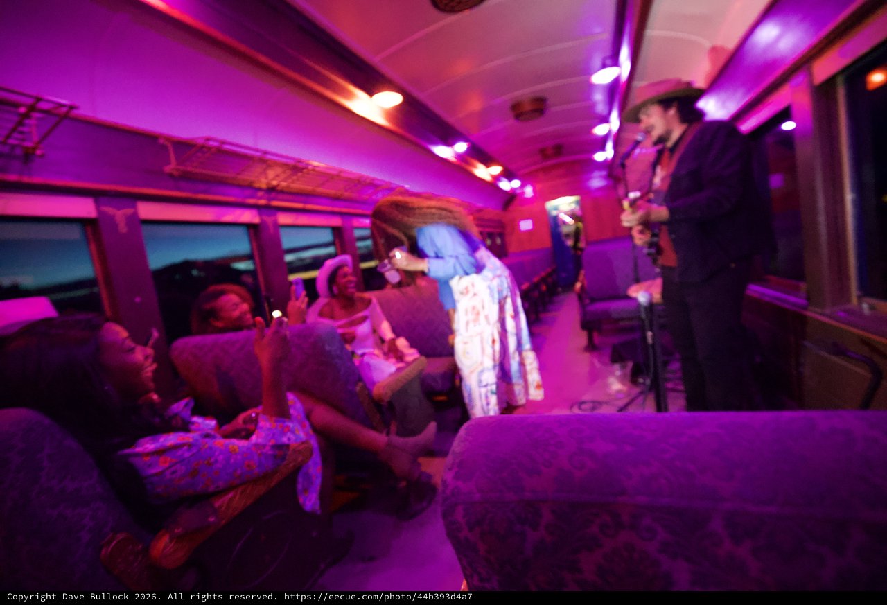 Live Music Performance on a Vibrant Train Car