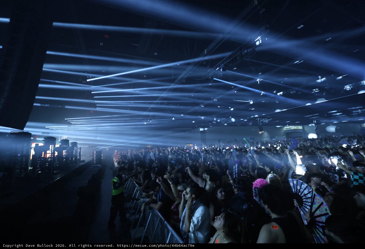 Massive Crowd Erupts Under Laser Light Storm