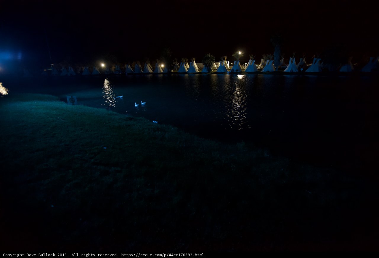 Illuminated Night Scene by the Lake