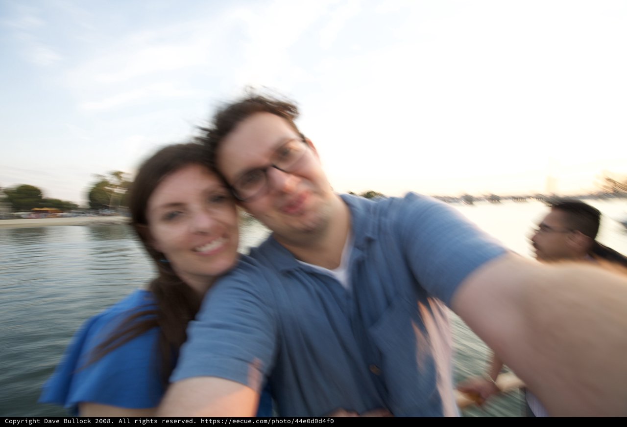 Blurry Couple Selfie by the Water at Dusk
