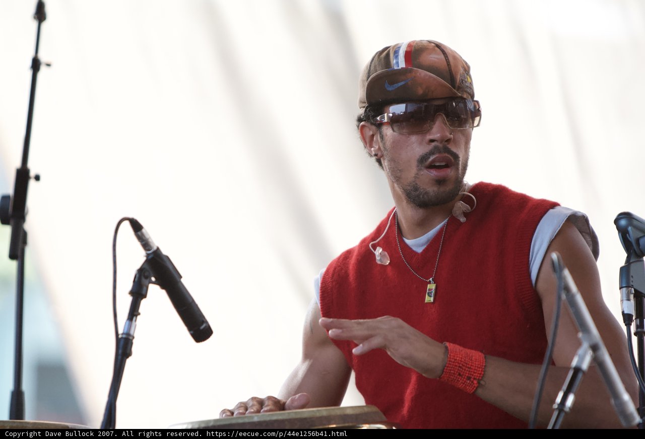Performer in Red Shirt and Sunglasses