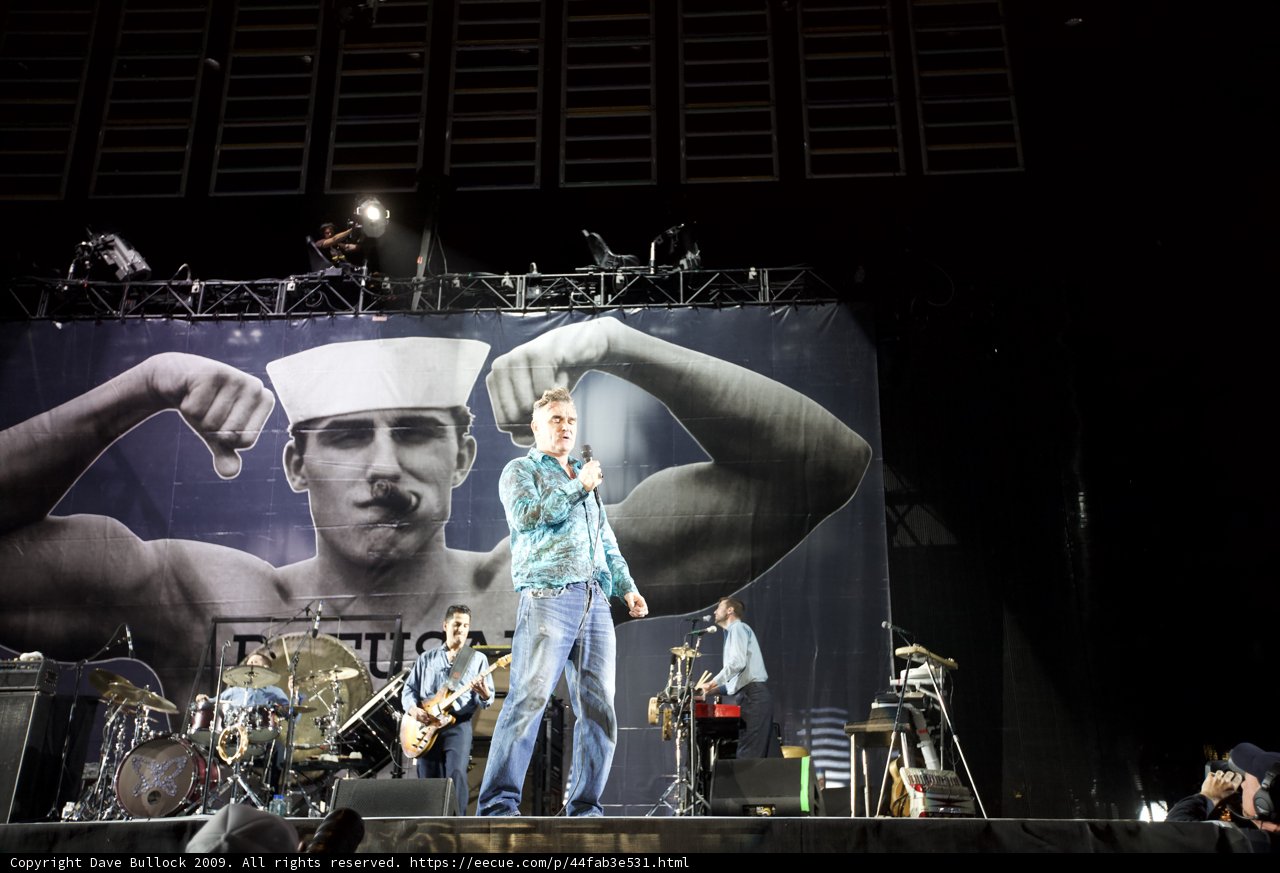 Morrissey and Rodrigo Corrales perform on stage