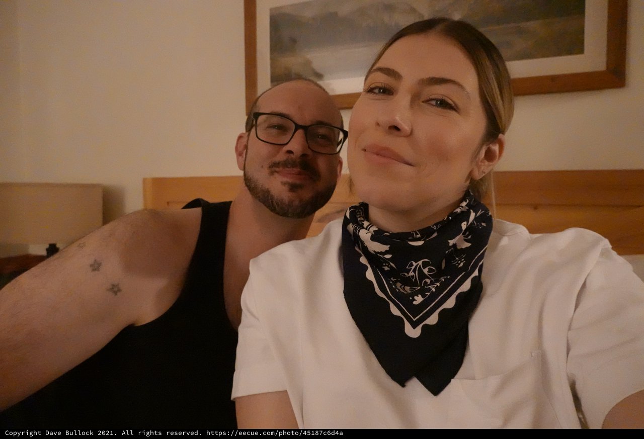 Couple's Intimate Bedroom Selfie Together