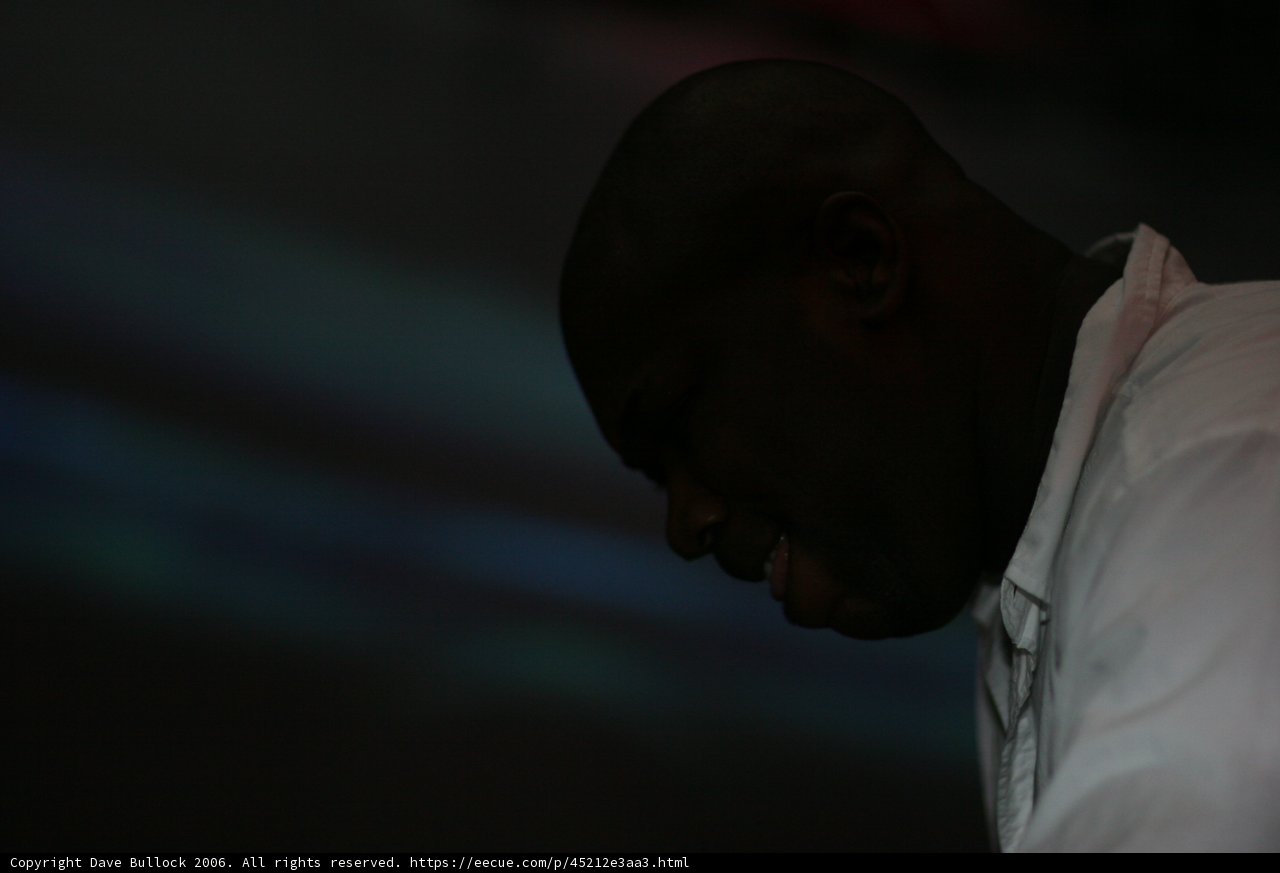 Contemplative Man in White Shirt