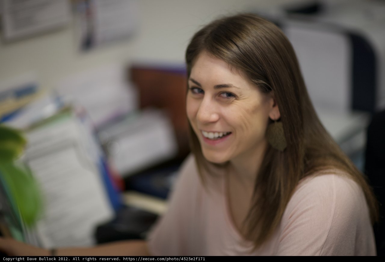 Happy Woman Working at her Desk