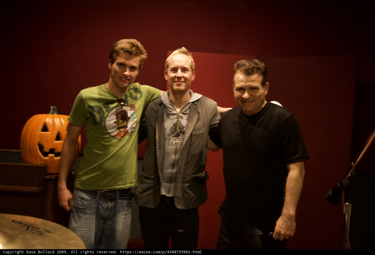 Three Men Rocking in the Studio