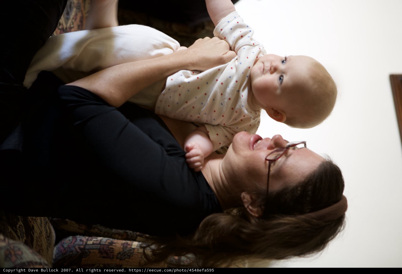Joyful Mother and Baby Share a Tender Moment