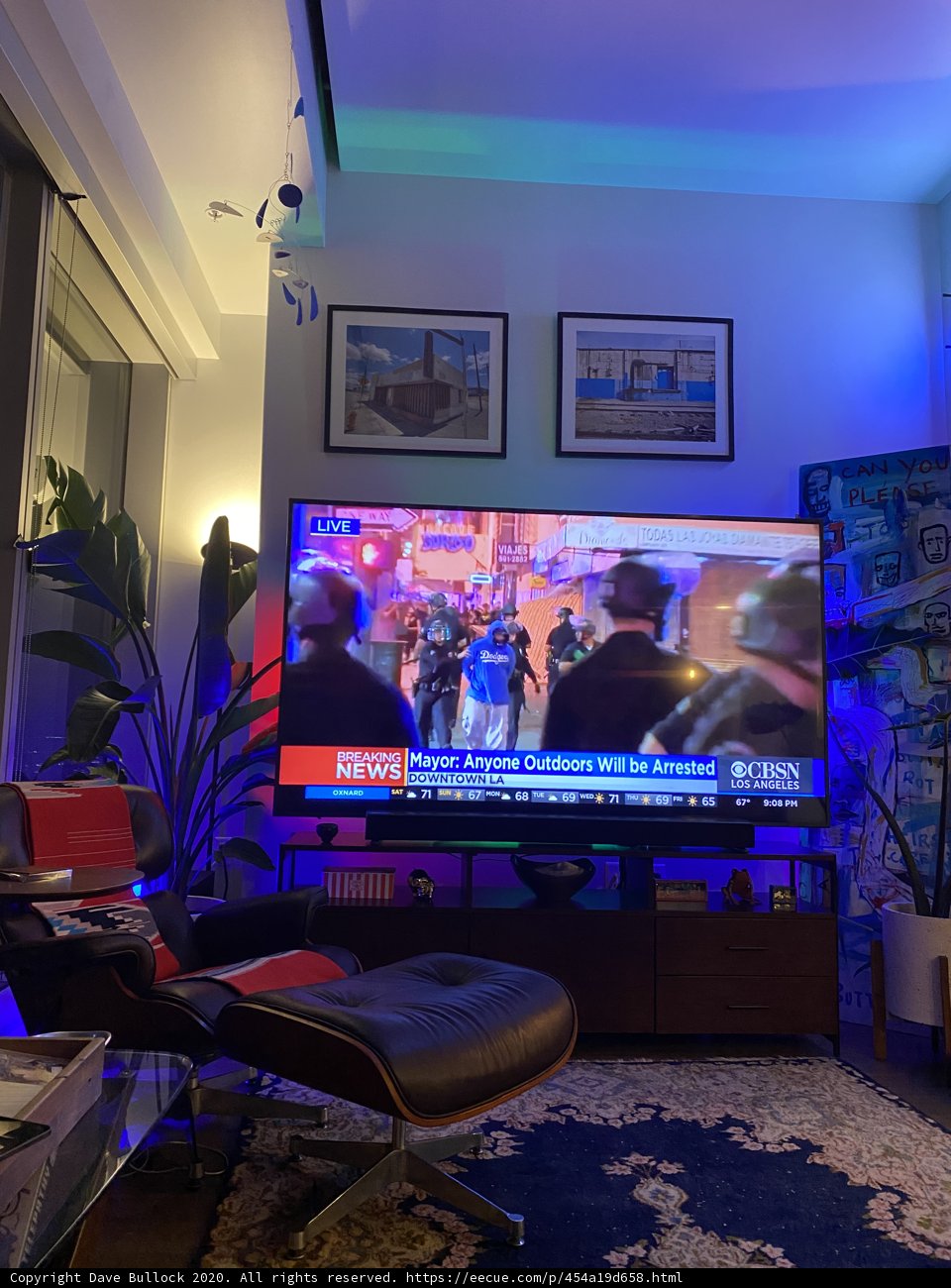 Cozy Living Room with a High-Tech Entertainment Center