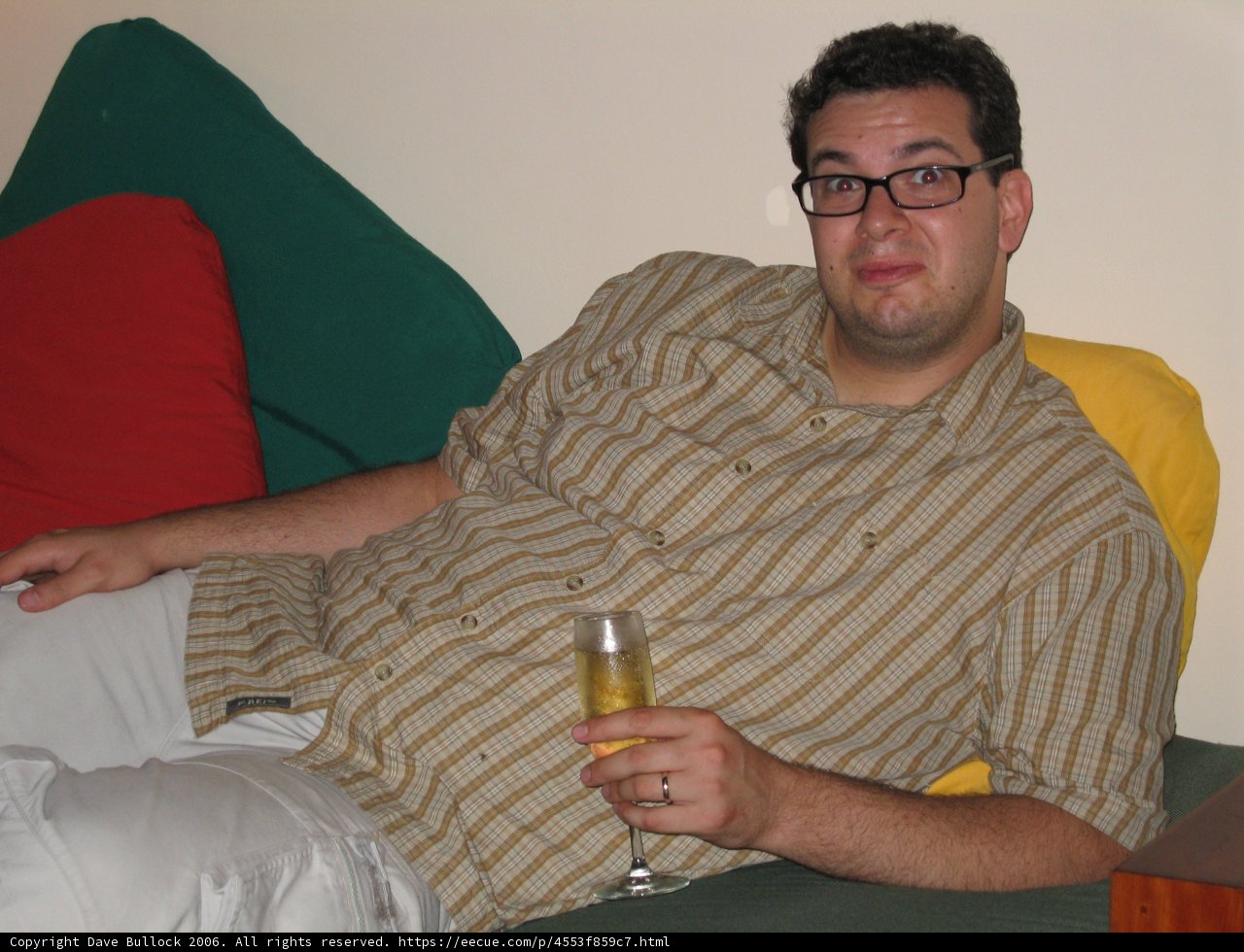 Man Enjoying a Cold One on the Couch