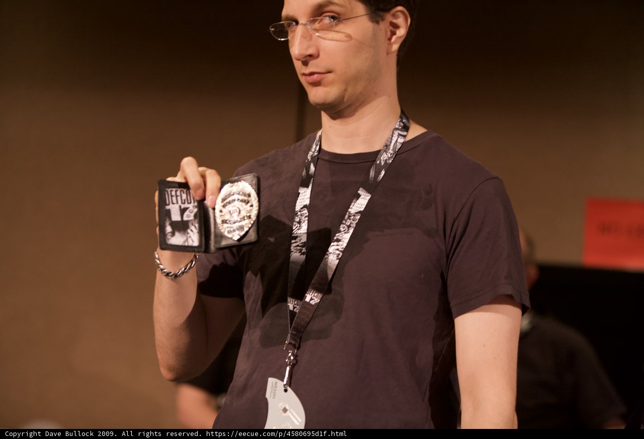 Jeff M Holding Badges and Trophies at DEFCON 17