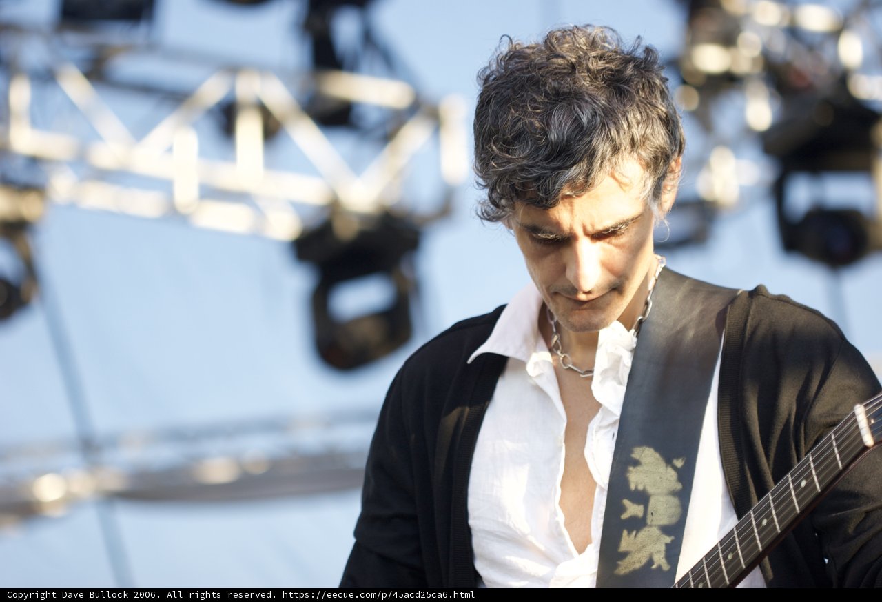 Rocking out on stage with a guitar