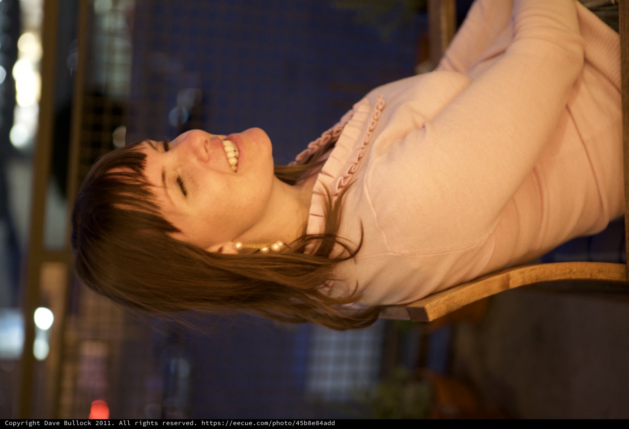 Joyful Woman Laughing in Warm Evening Light