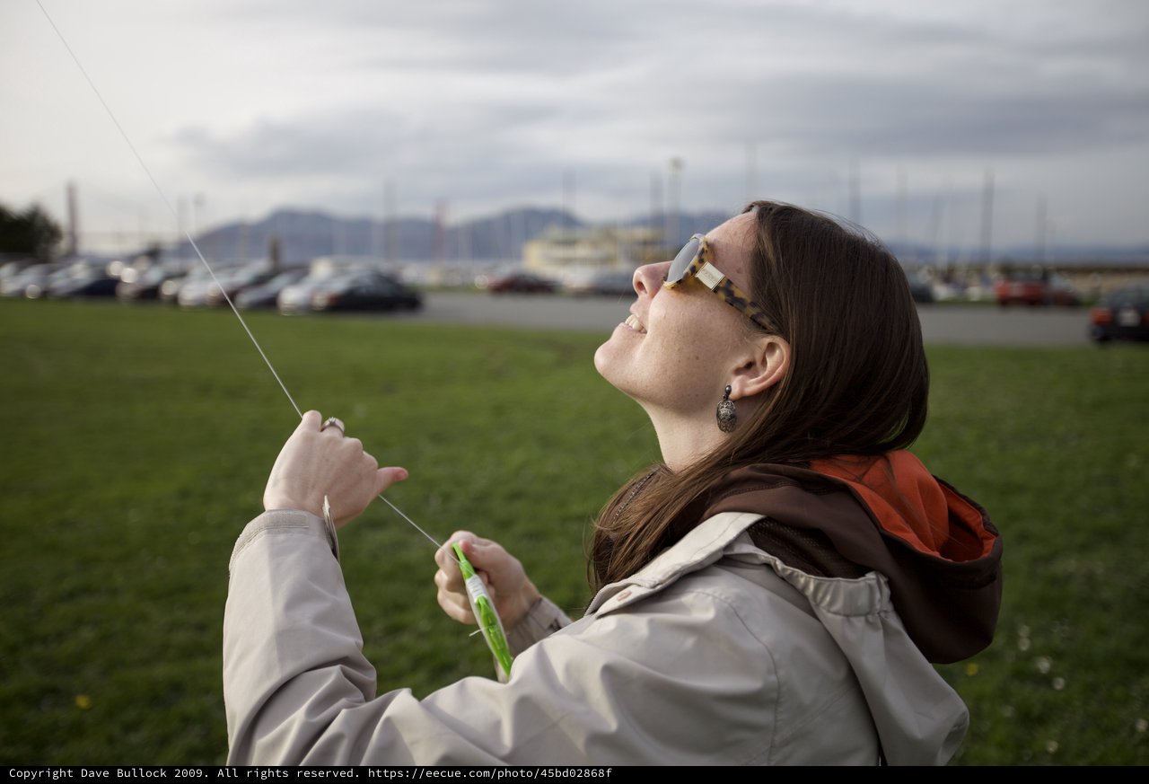 Woman Flying Kite at San Francisco Bay Park
