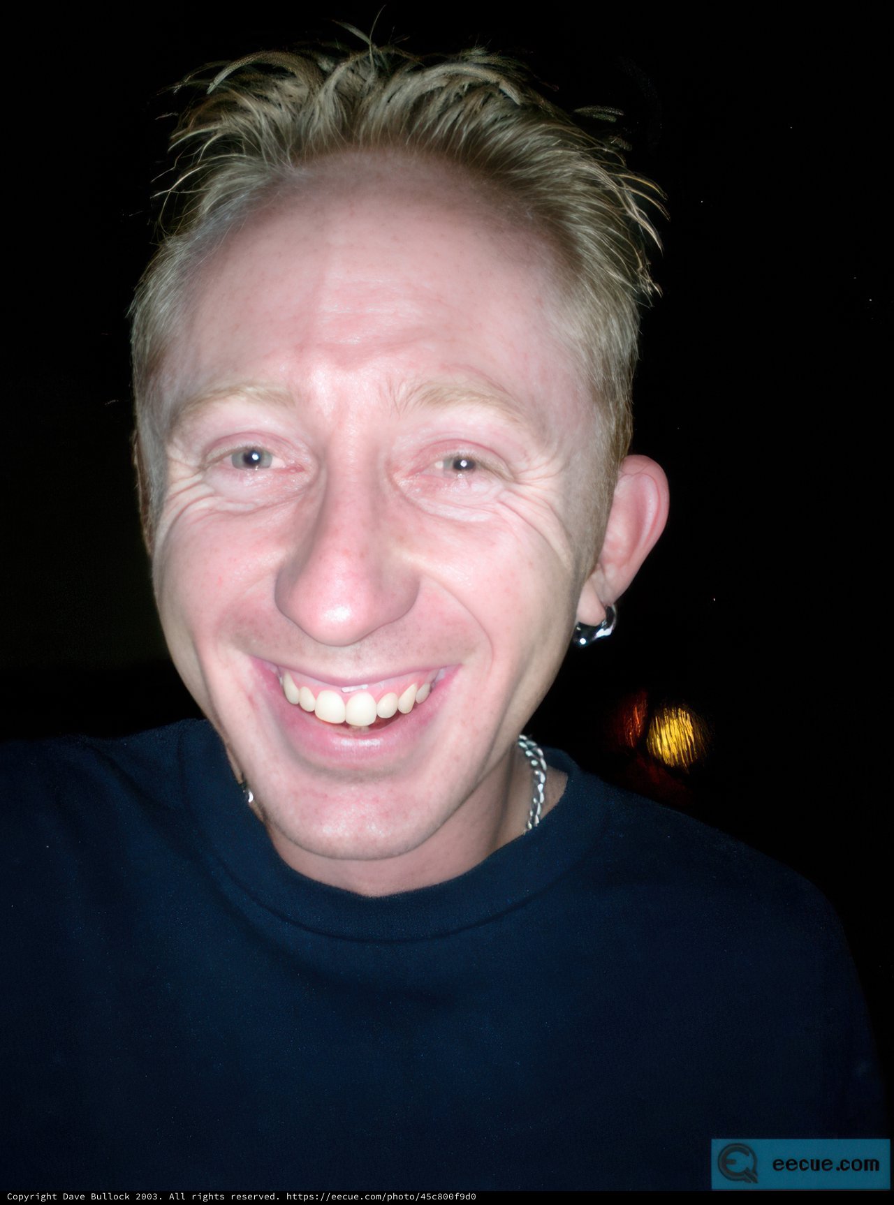 The Happy Man with Two Necklaces