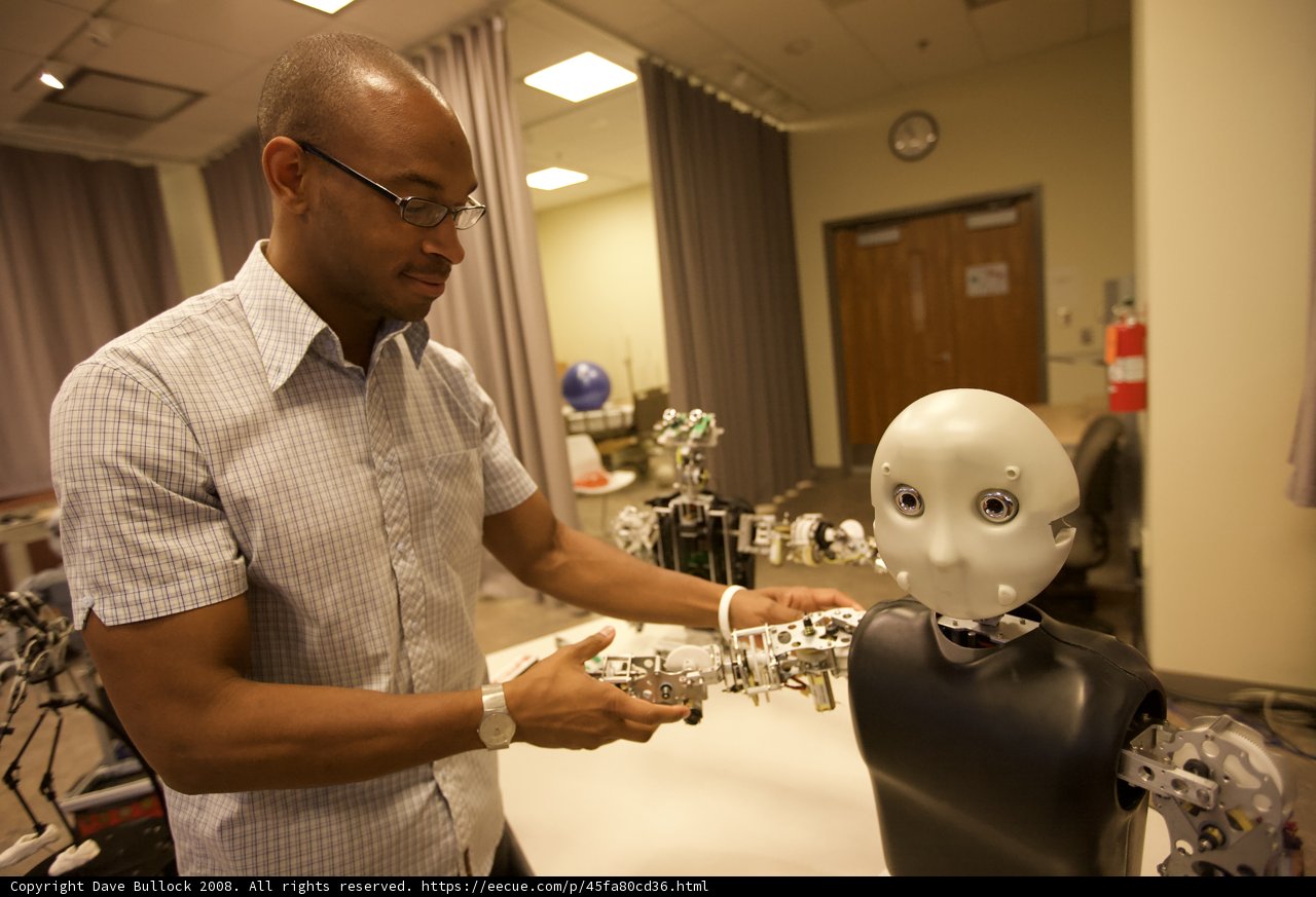 Man and Robot in a Room