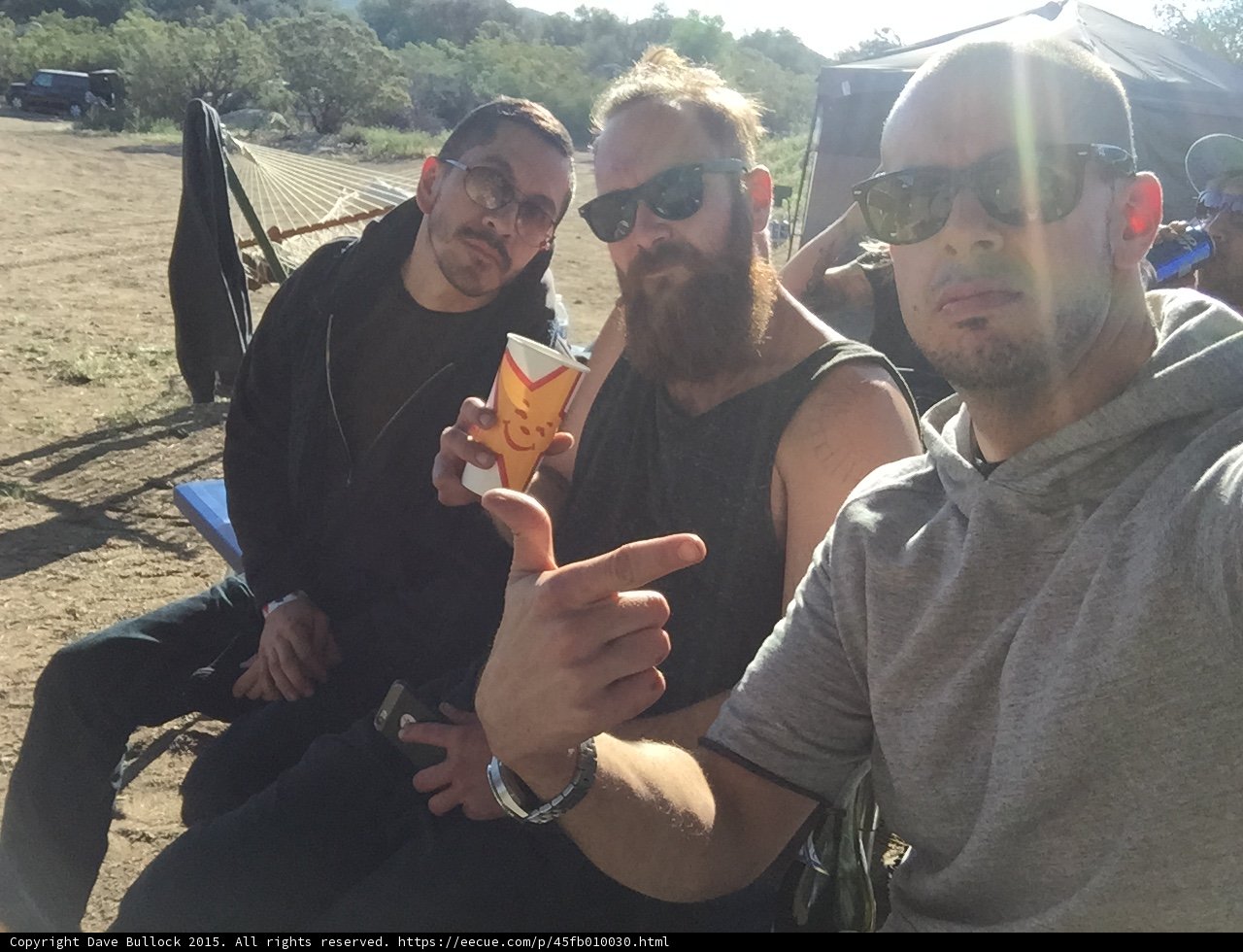 Three Friends Enjoying a Cold Beer Outdoors