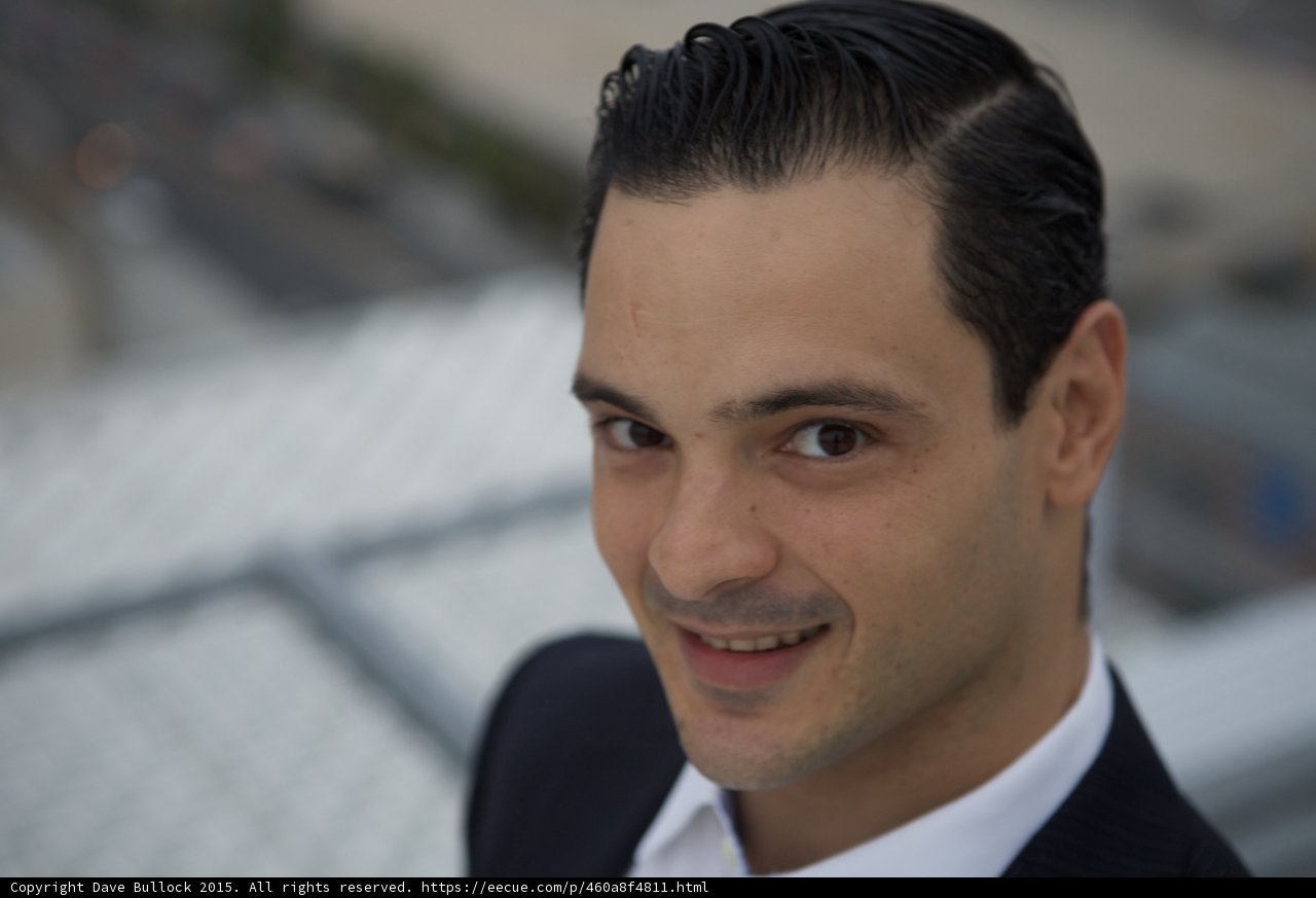 The Smiling Man in Formal Wear