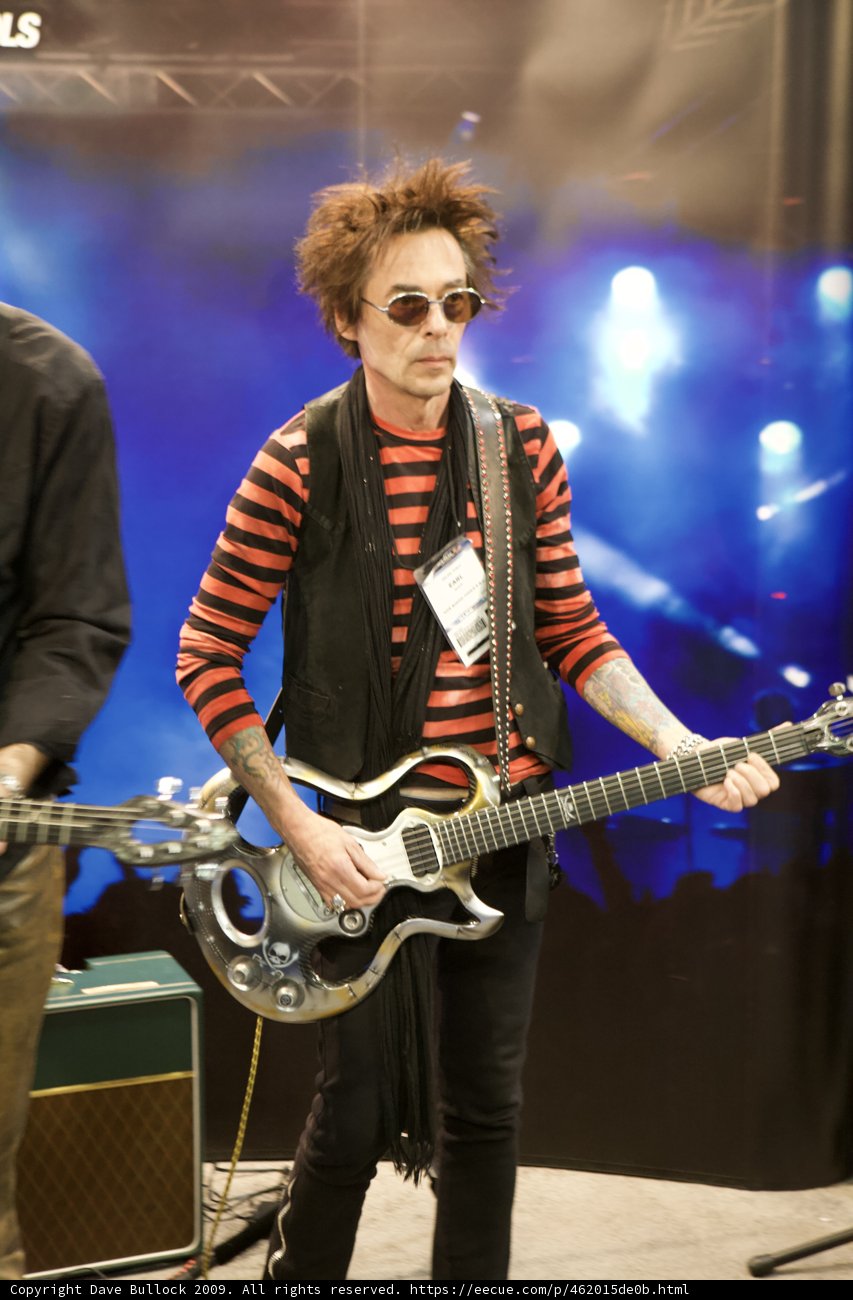 Earl Slick rocks the stage in black